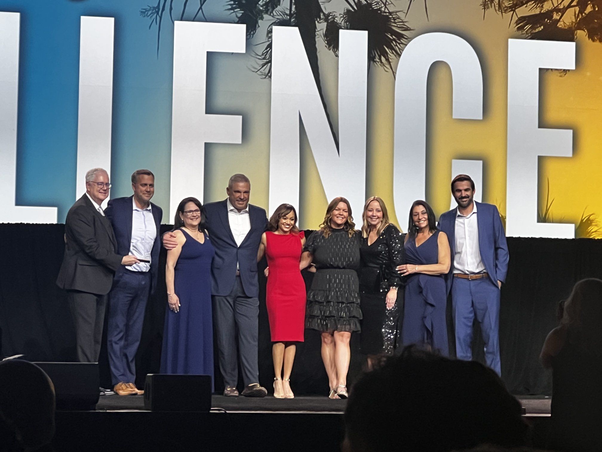 The Avoya Travel team, led by Phil Cappelli, Chief Executive Officer of Avoya Travel, accepts the award onstage during TLN Edge 2026 alongside TLN representatives.